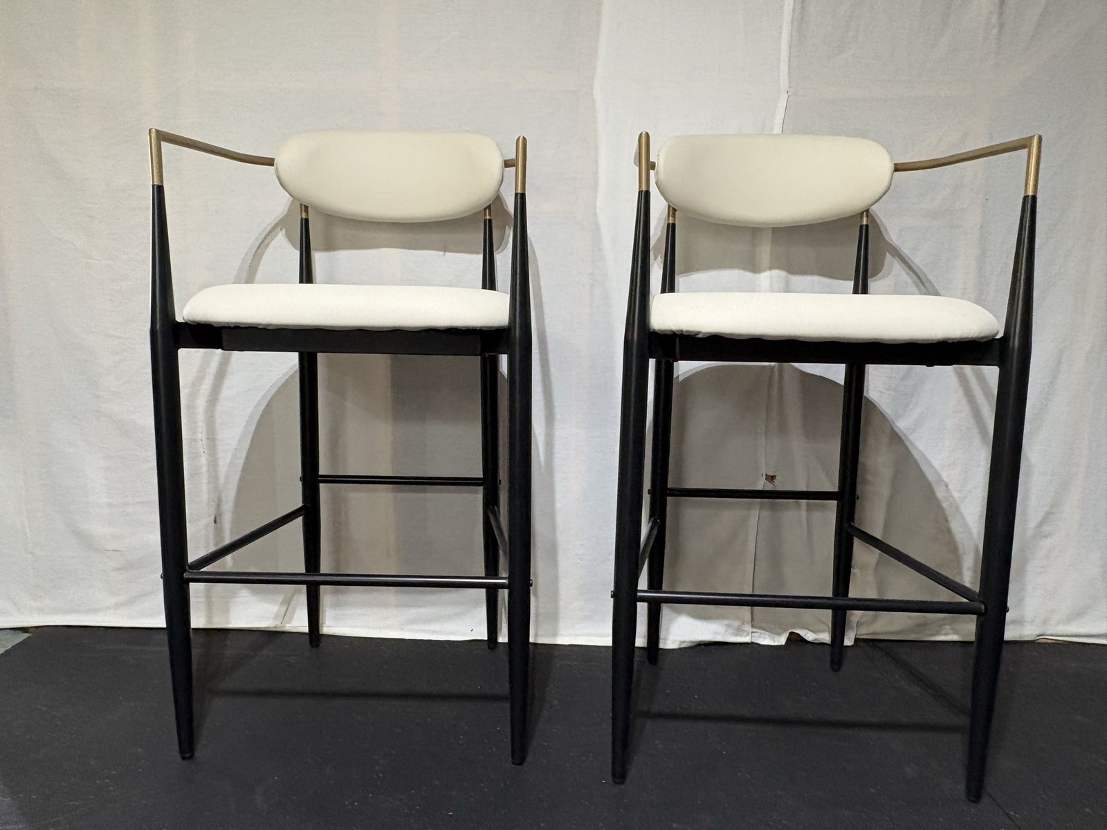 2 Modern Black & Gold Frame Bar Stools with Cream Upholstered Seats - Counter Height Chairs