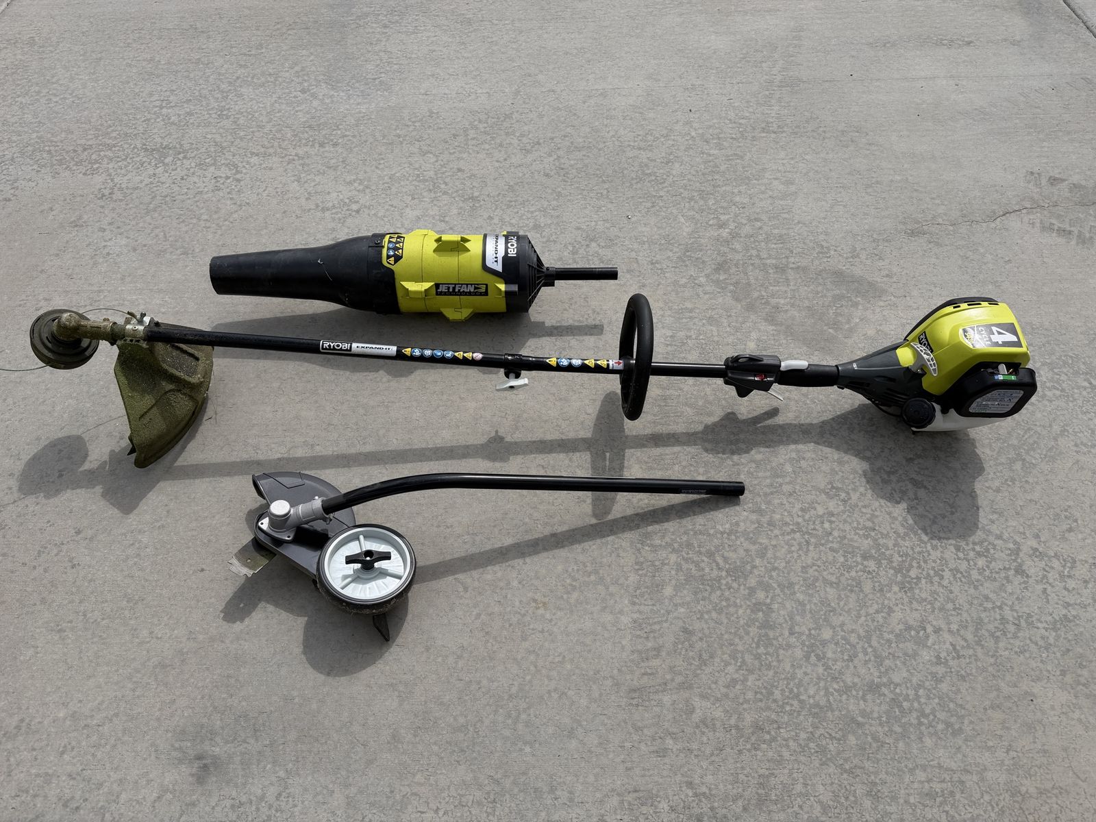 Ryobi S430 4-Cycle Expand-It Gas Trimmer with Leaf Blower & Edger Attachments
