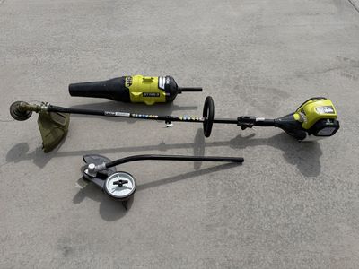 Ryobi S430 4-Cycle Expand-It Gas Trimmer with Leaf Blower & Edger Attachments