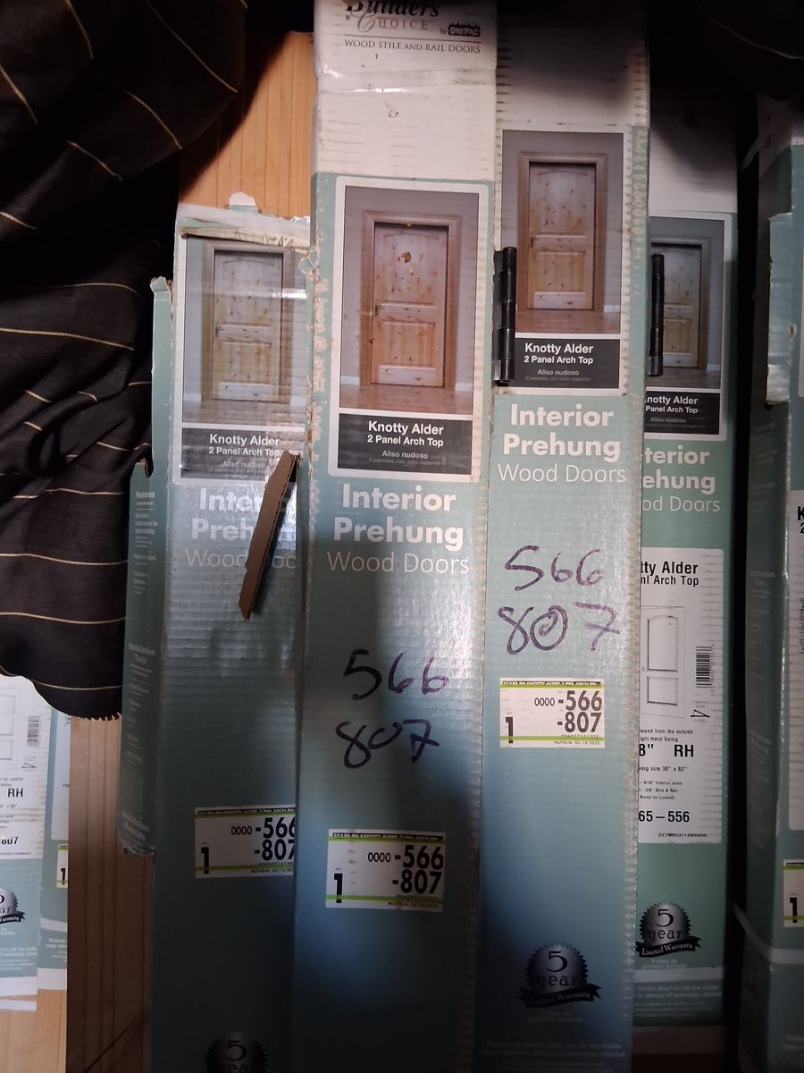 Per hung unstained Burch doors