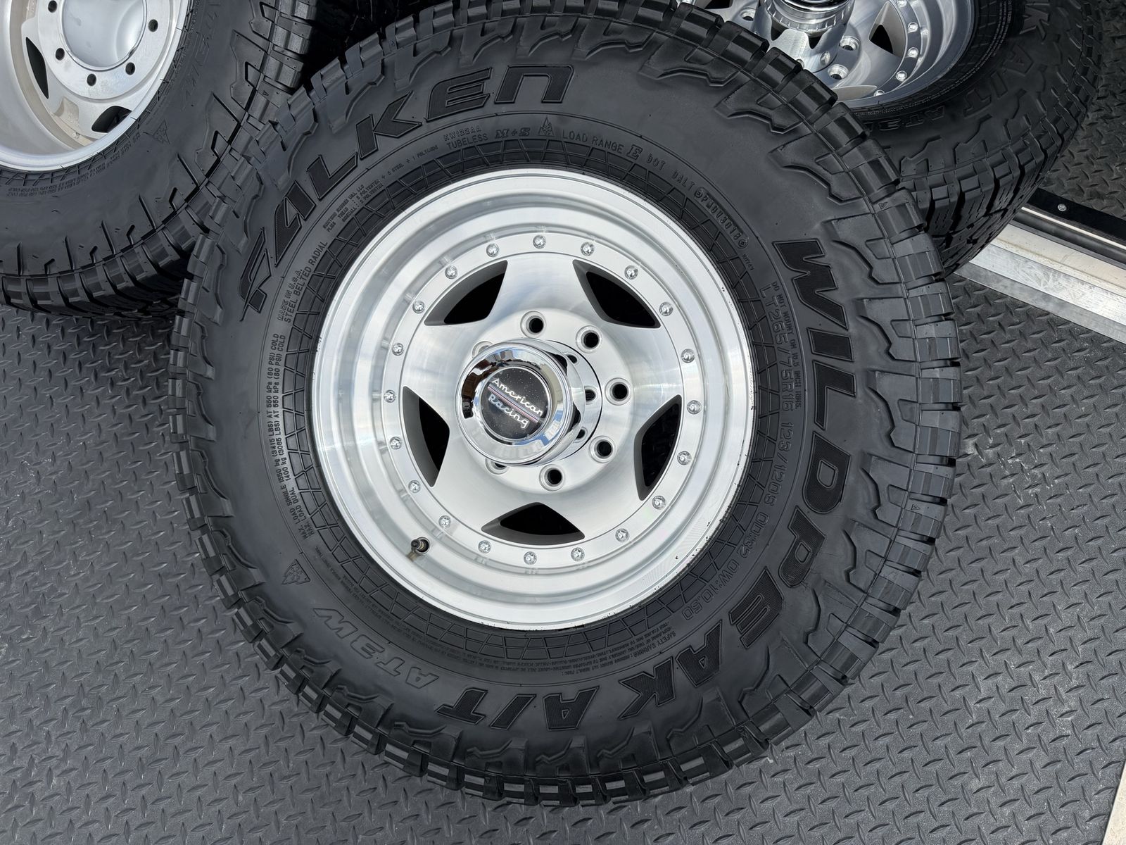 16” American Racing 8 Lug 8x6.5 | 8x165.1 32” Falken AT3w 265/75R16