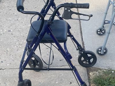 Blue Rolling Walker with Seat and Hand Brakes