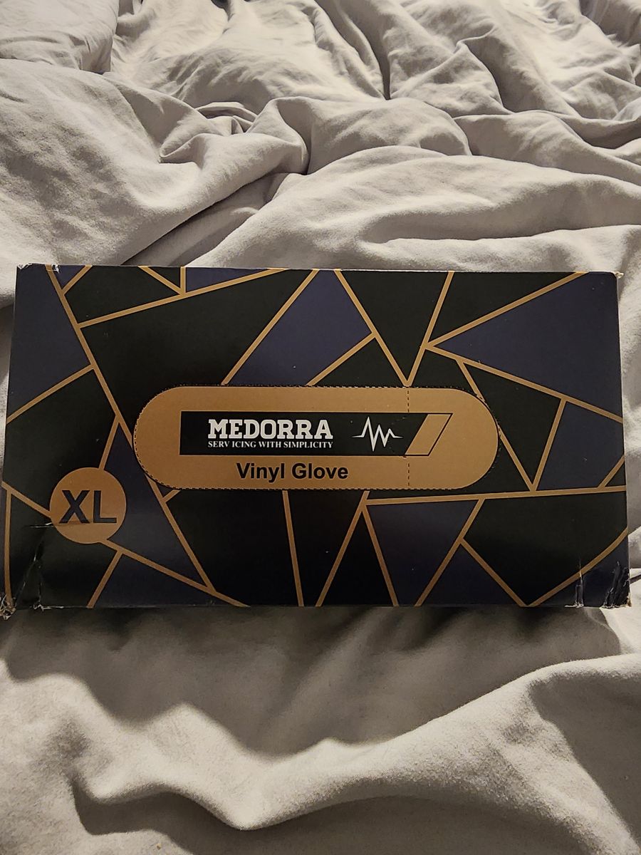 Boxes of medorra vinyl gloves