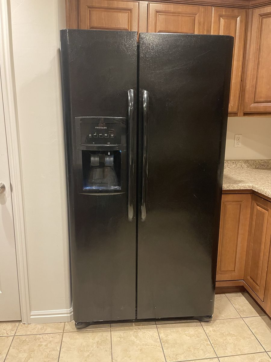 Frigidaire black side-by-side refrigerator