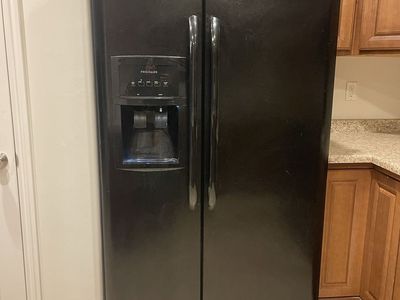 Frigidaire black side-by-side refrigerator