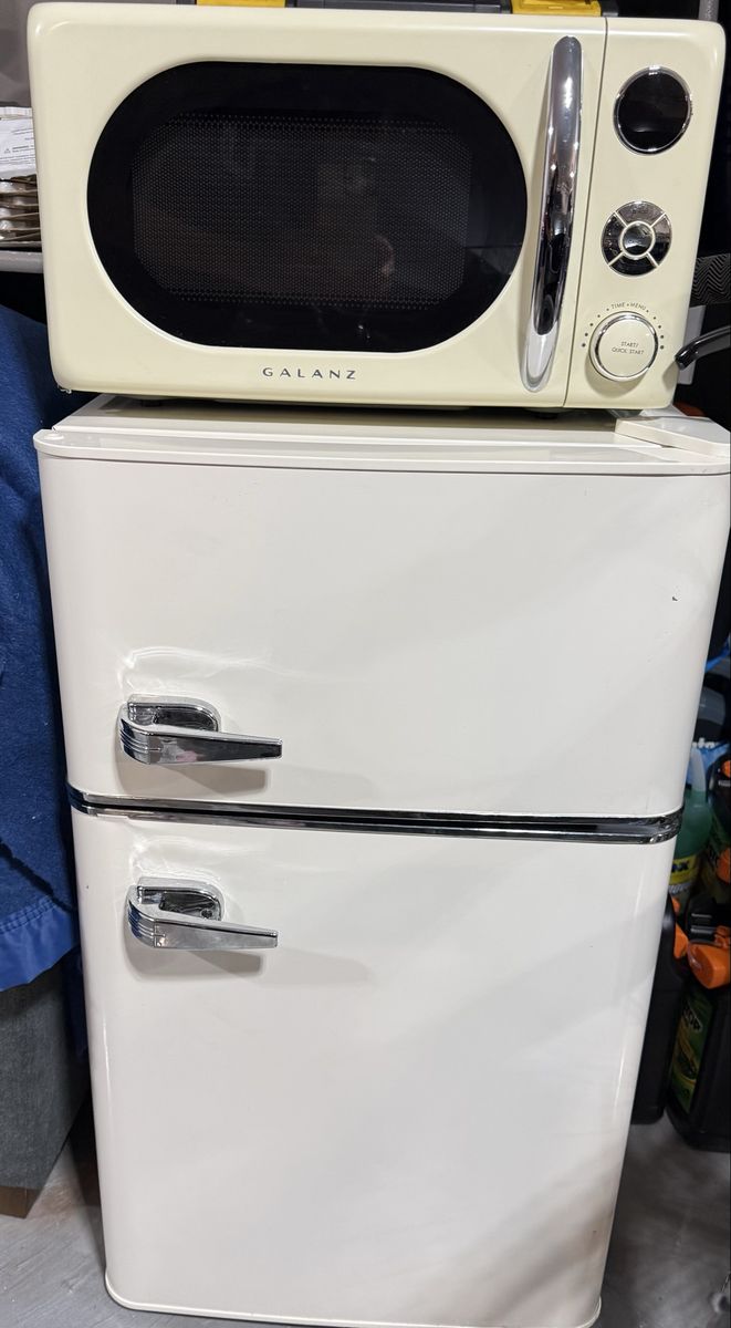 Compact ivory Top Freezer Refrigerator with Chrome Handles - Ideal for Small Spaces and Microwave (not pictured)