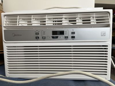 Air Conditioner Window Unit (includes stand and instructions)