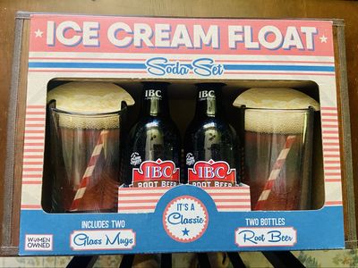 Ice cream float IBC root beer soda set two foaming mugs and two glass bottles of root beer