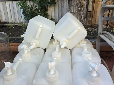 WATER CONTAINERS. 5 GALLON.