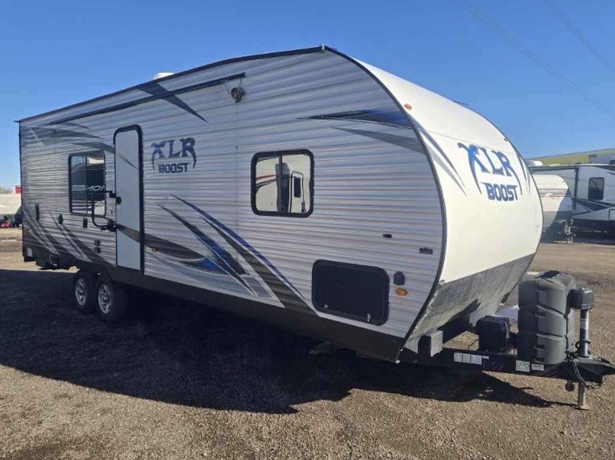 2020 Forest River boost XLR 27QB toy hauler with generator 15 foot garage