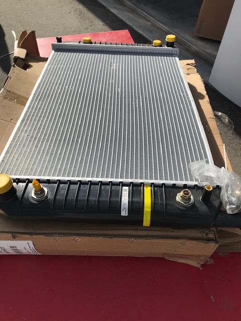 New qty 4 radiators and Qty 1 radiator fan