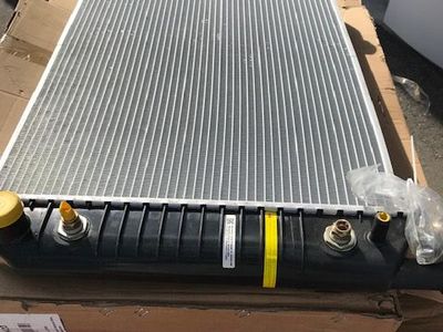New qty 4 radiators and Qty 1 radiator fan