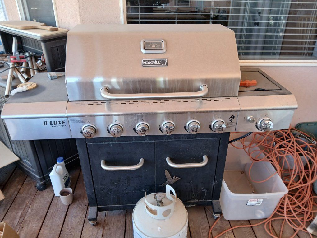 Nexgrill D'Luxe 6-Burner Propane Gas Grill with Side Burner Stainless Steel