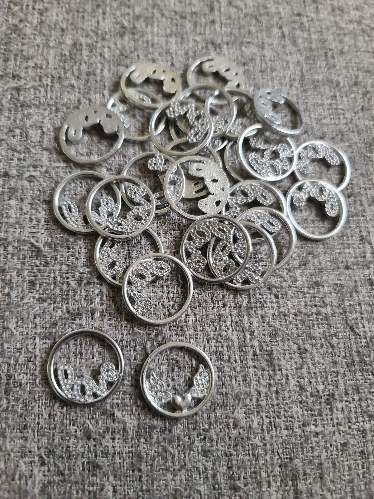 Love charms and one heart with angel wings