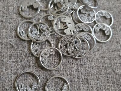 Love charms and one heart with angel wings