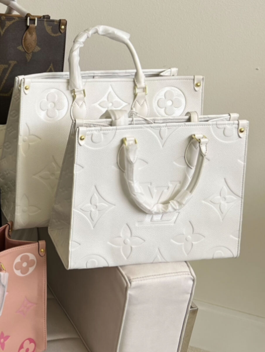 Gorgeous, oversized, leather embossed purse