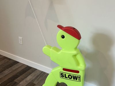 Kids at Play Safety Sign - Bright Yellow "Slow!" with Red Flag, Traffic Warning for Drivers