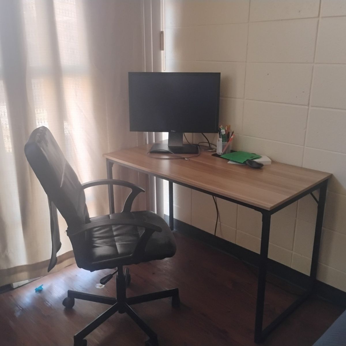 Work table, chair and computer monitor