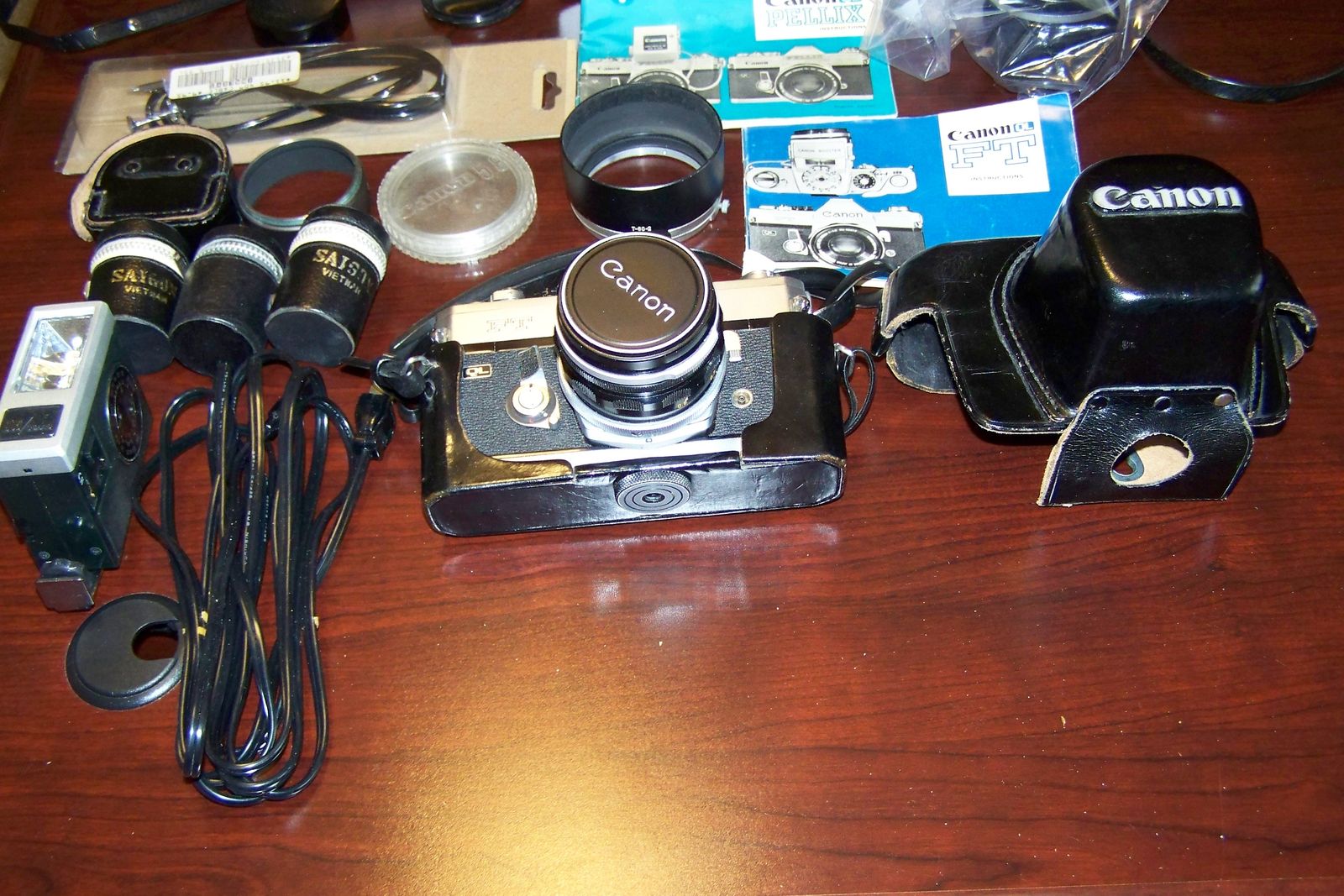 2 each vintage film Canon FT-QL cameras and equipment.