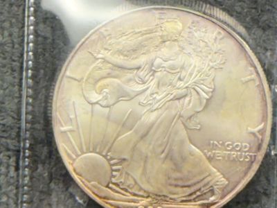 1 Silver Eagle 2006, 1 Silver Round, 2 Panda Medals NGC graded PF 70