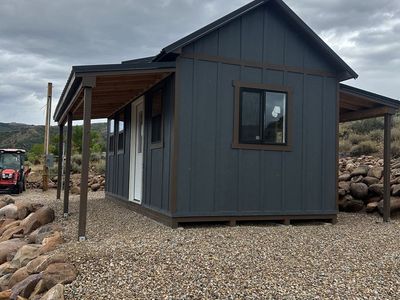 10x20 shed cabin with awnings.