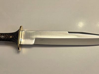 Stainless Steel Bowie with a pinecone/epoxy resin handle and brass furniture