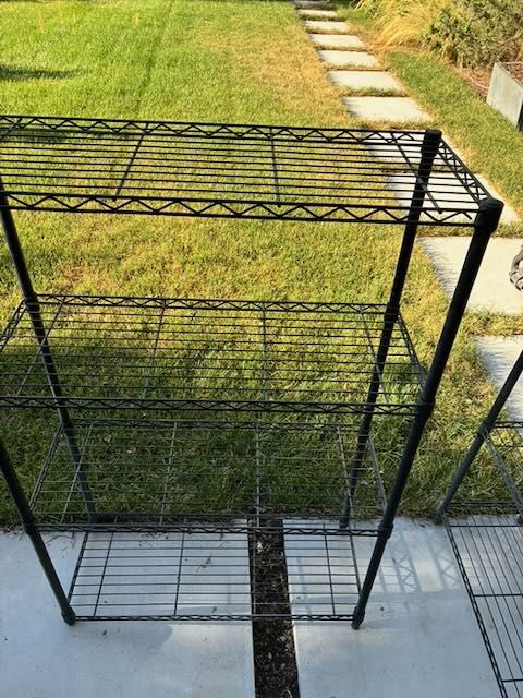 Three (3) HDX wire storage racks: ~55"H x 36"W x 14"D. 4 shelves per rack