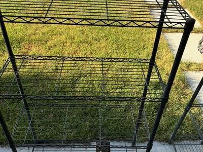Three (3) HDX wire storage racks: ~55"H x 36"W x 14"D. 4 shelves per rack