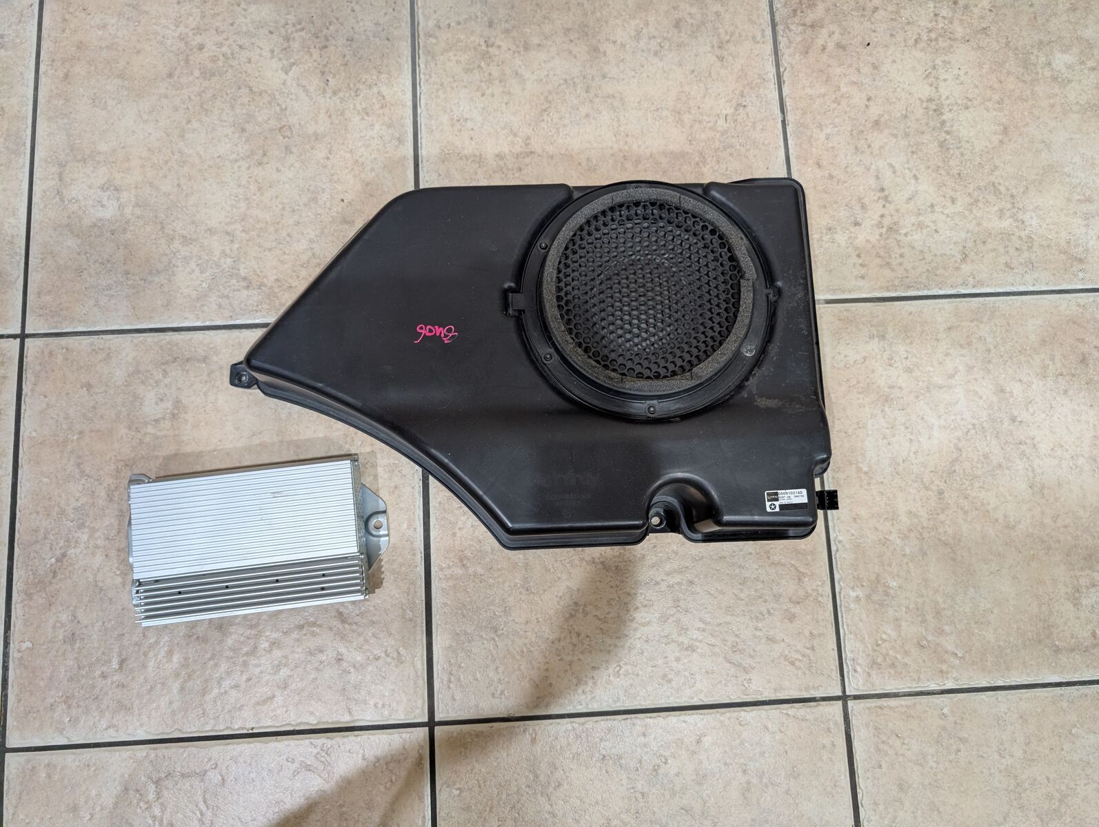 Dodge Nitro combo: factory sub, factory amp, factory quarter trim panel