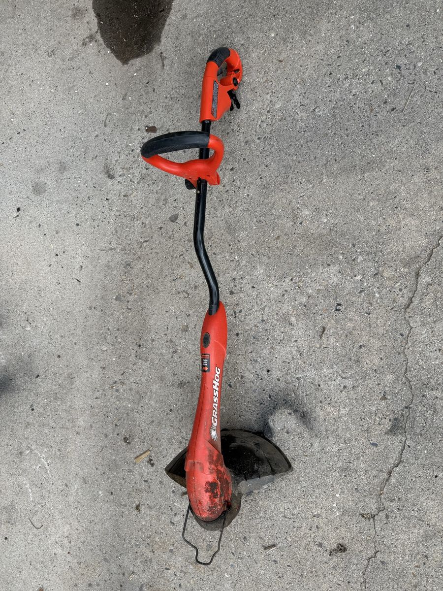 Grass hog weed eater