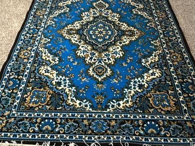 Rugs each $100