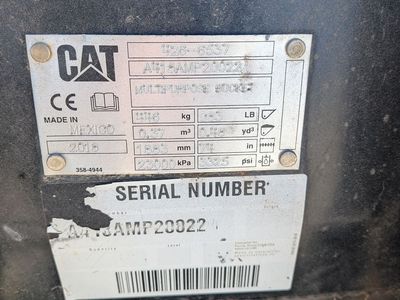 74" Cat Skid Steer Compact Track Loader 4-in-1 loader bucket. Doze, dig, grade, grab.