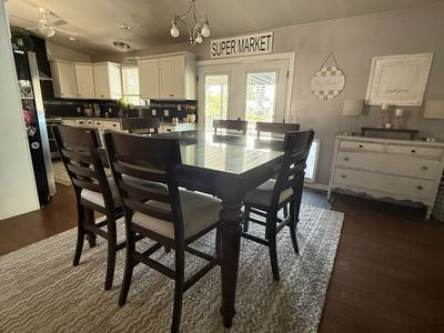 Dark Wood Dining Table Set with Glass Top and 6 Upholstered Chairs