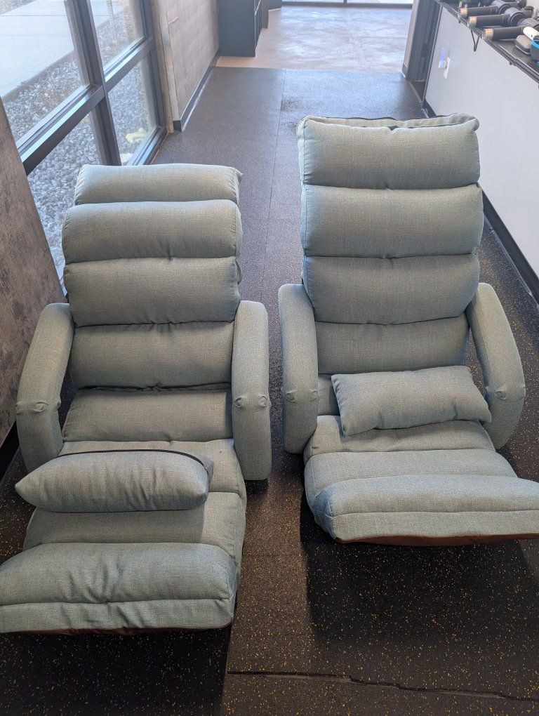 2 comfortable on ground gaming chairs/ recliners