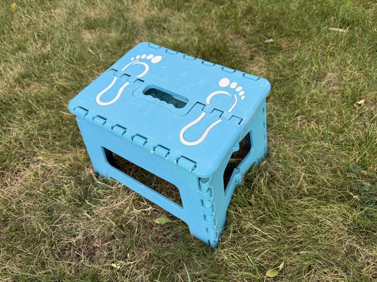 Blue Plastic Foldable Step Stool with Footprint Design - Portable & Lightweight