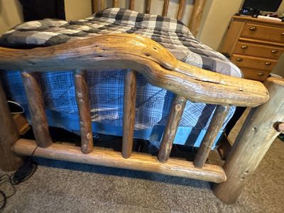 Asthetic vintage log bed frame.