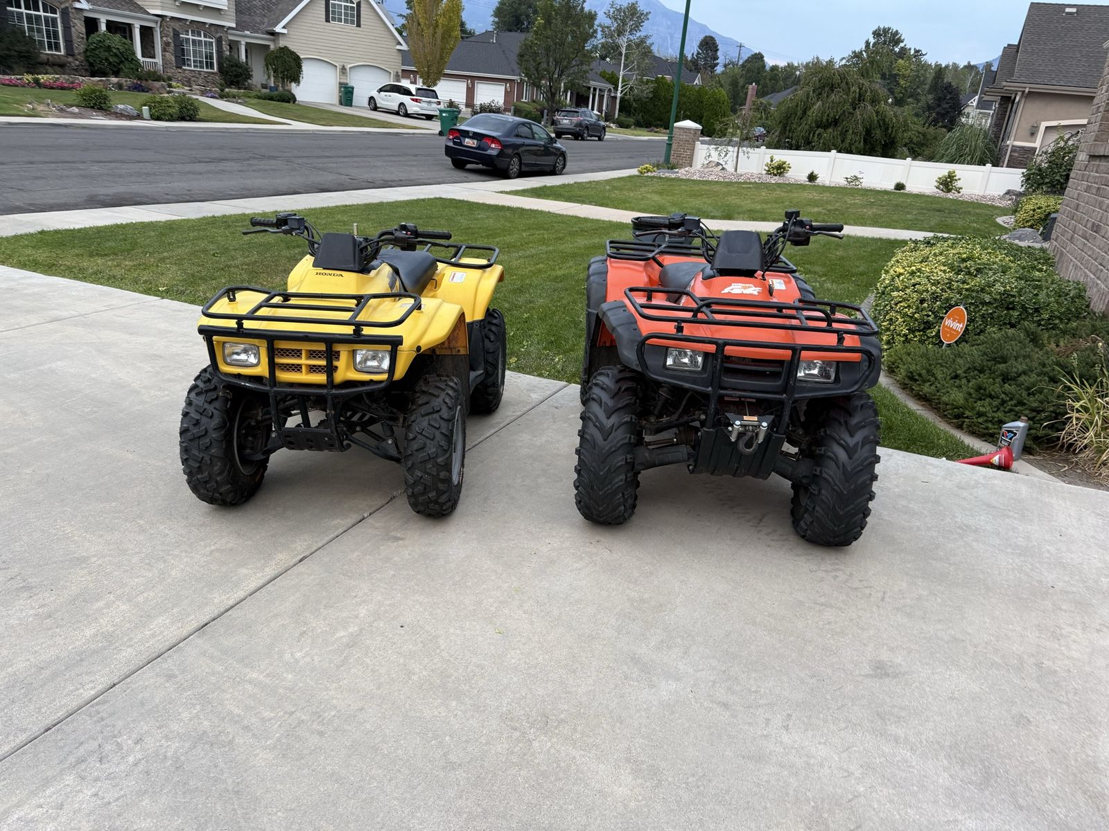 Pair of clean Honda ATVs - 2004 Honda Recon ES and 2001 Honda Rancher ES 4x4 with Snow Plow and winch