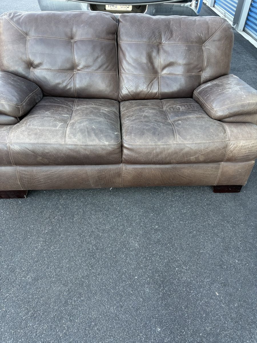 *Leather love seat