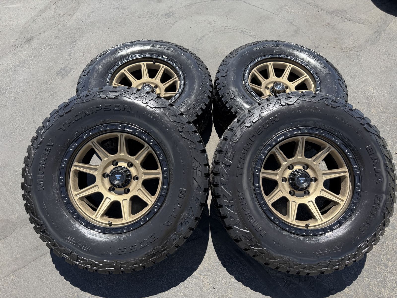 New Desert Bronze Fittipaldi FT104 285/70r17 Mickey Thompson Baja Boss AT 6x5.5 Chevy Silverado 1500 Toyota Tacoma GMC 6 lug