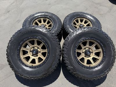 New Desert Bronze Fittipaldi FT104 285/70r17 Mickey Thompson Baja Boss AT 6x5.5 Chevy Silverado 1500 Toyota Tacoma GMC 6 lug