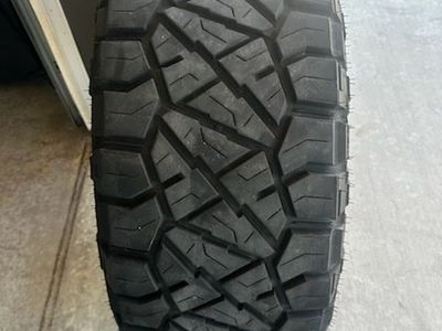 Set of 4 Used Nitto Mud-Terrain Tires - 35X12.50R17LT