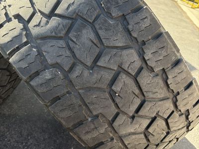 Used Toyo AT 3’s 35x12.50R20LT Tire on an KMC XD wheel