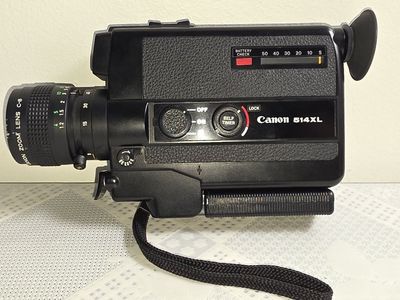 Canon 514XL Super 8 Movie Camera with 9-45mm f/1.4 Zoom Lens released on 1976.