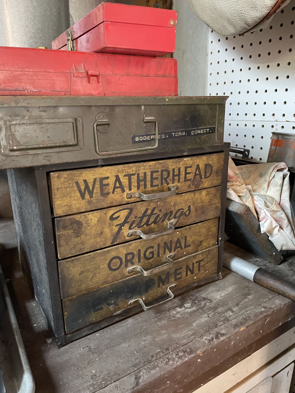Antique metal tool box with fittings.
