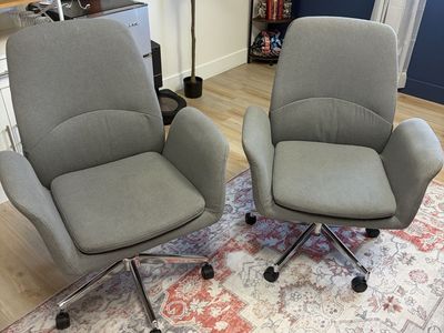 Pair of Gray Upholstered Swivel Office Armchairs with Chrome Rolling Bases