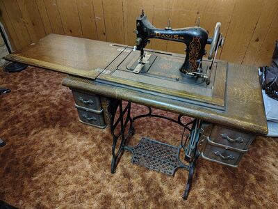 Davis Antique Vertical Feed Treadle Sewing Machine in Oak Cabinet - $350 - o.b.o.