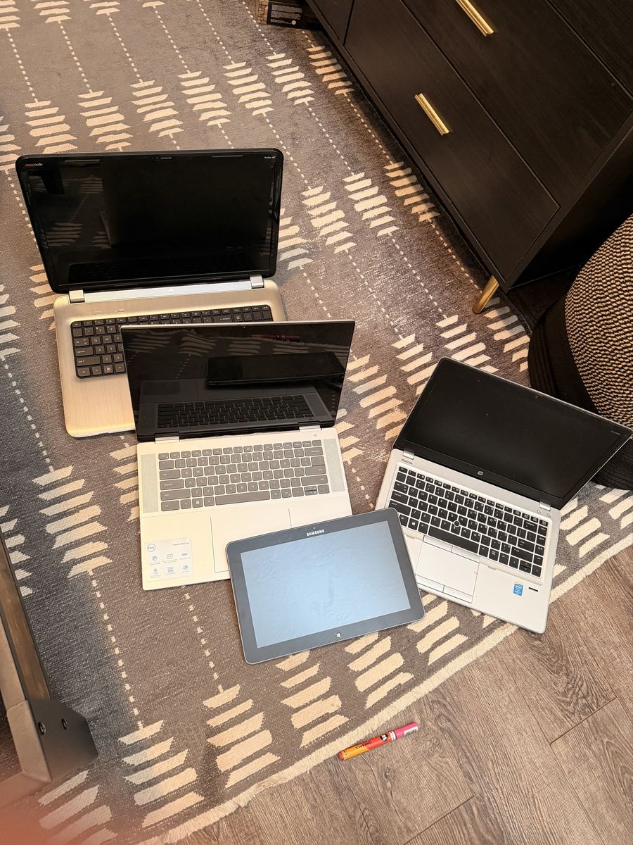 Lot of laptops and one tablet