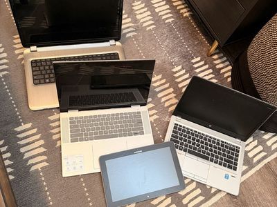 Lot of laptops and one tablet