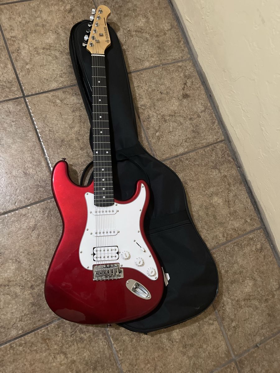 Donner electric guitar and carrying case