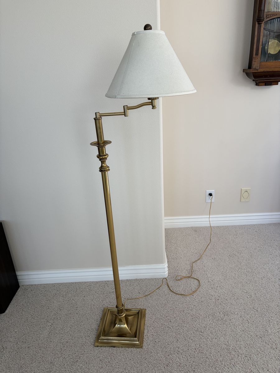 Brass floor lamp with a square base